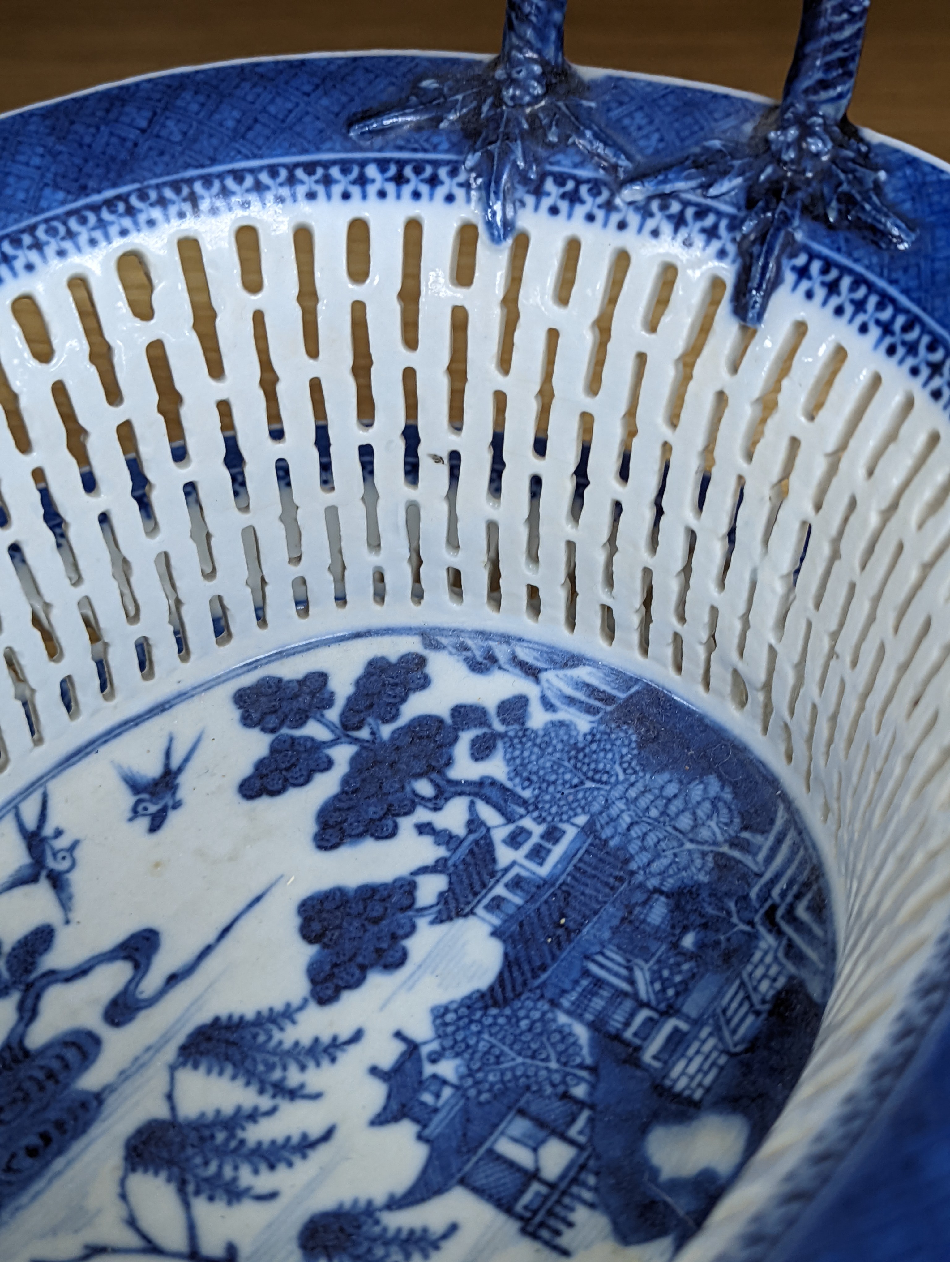 A Chinese blue and white chestnut basket and stand, Qianlong period, basket 11 cms high.